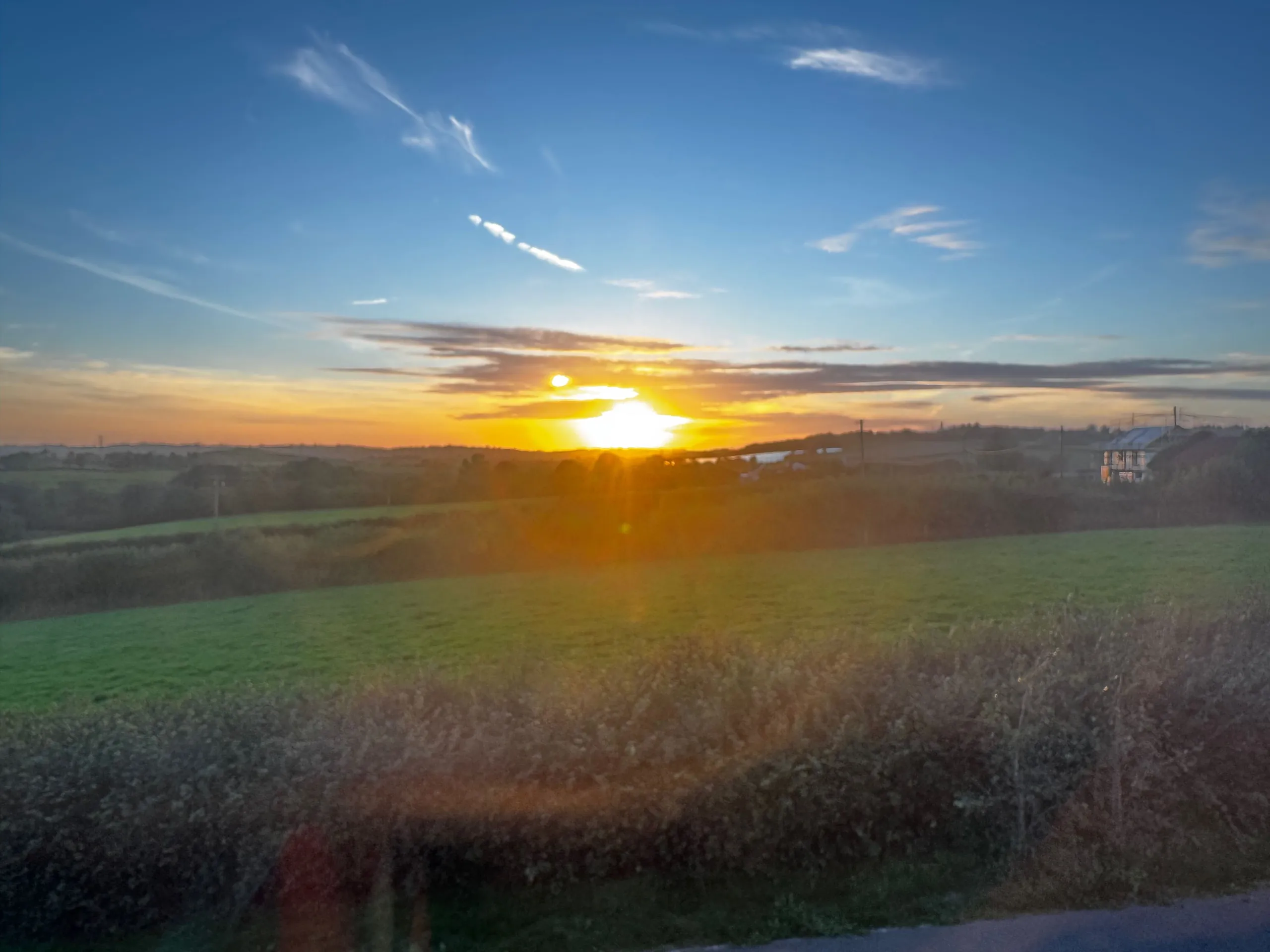 Evening light over fields near King's Nympton